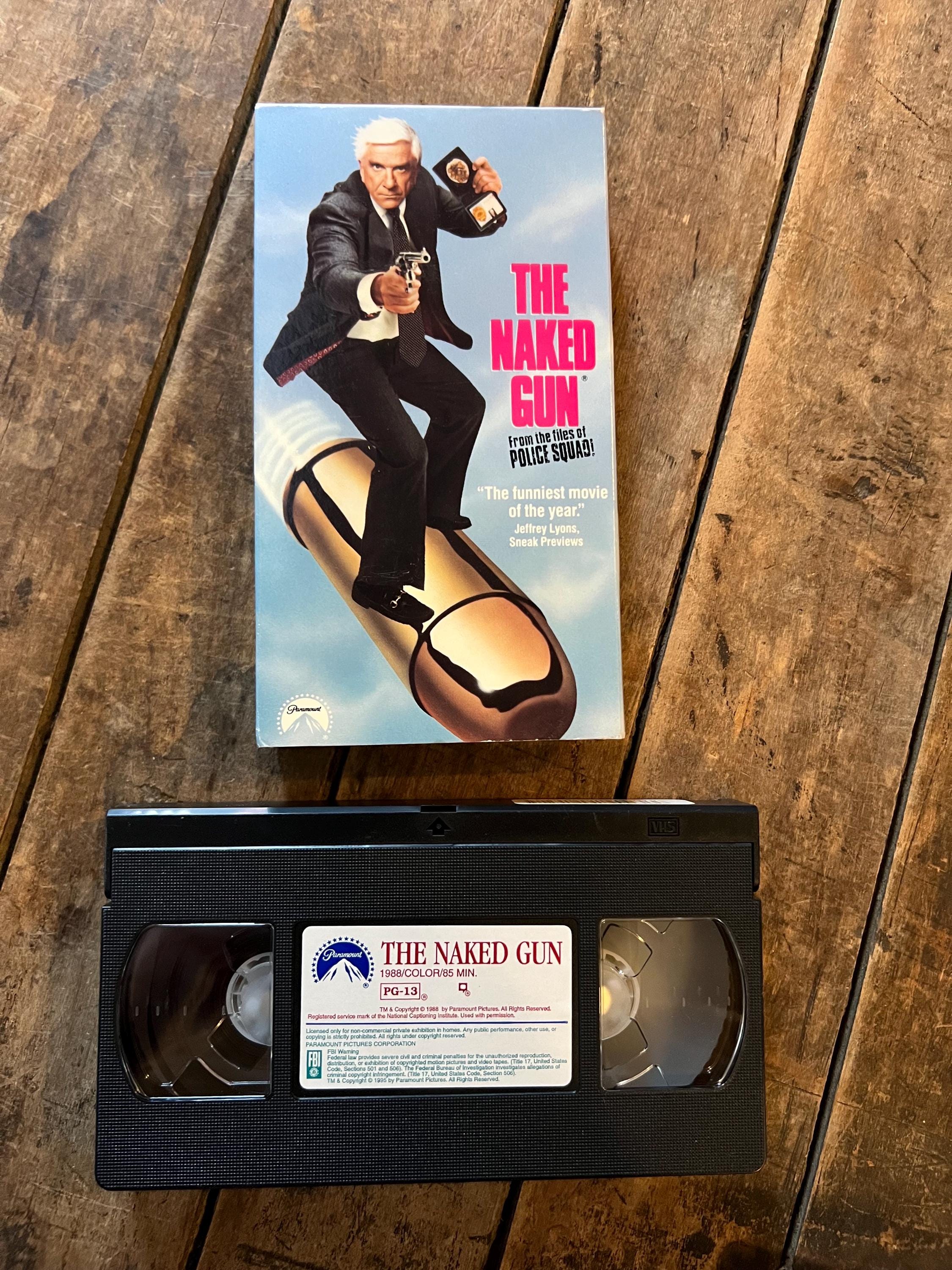 The Naked Gun - From the Files of Police Squad ( VHS 1988 ) Starring - Leslie Nielsen & Pricilla Presley